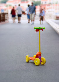 Close-up of toy car on road