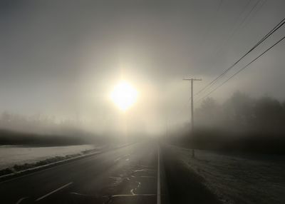 Road against sky during winter