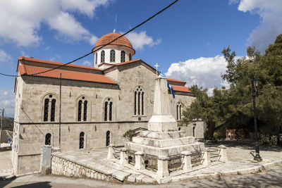 Exterior of historic building against sky