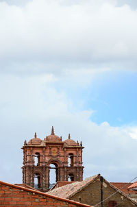 High section of building against sky