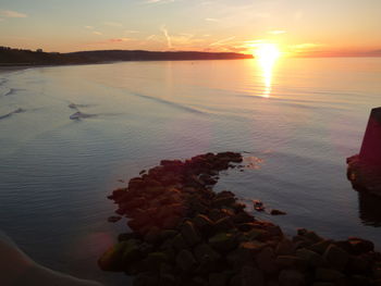 Scenic view of sunset over sea