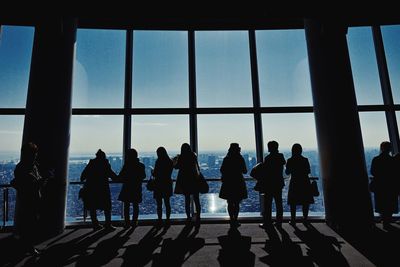 Girls are looking the views and take selfies at the tower in tokyo