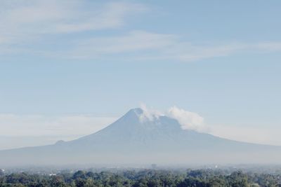 Scenic view of volcanic mountain against sky