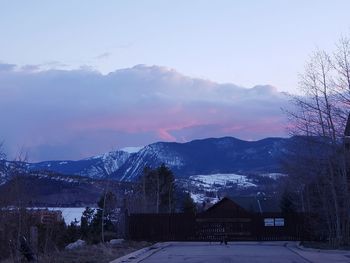 Scenic view of snow covered mountain against sky