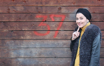 Portrait of a smiling young woman outdoors