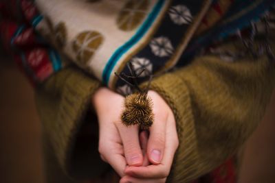 Close-up of woman holding hands