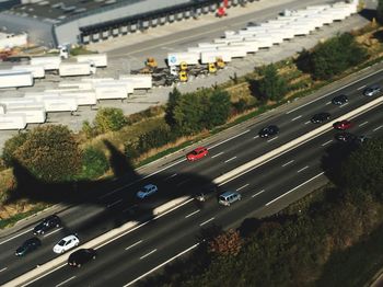 High angle view of cars on road against sky