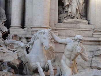 Statue of statues on historic building