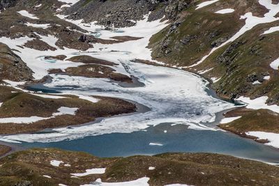 High angle view of river by snow