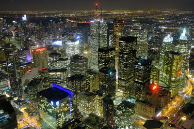 High angle view of illuminated buildings in city at night