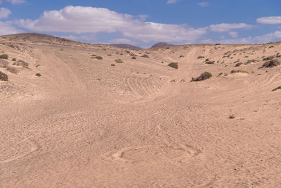 Scenic view of desert against sky