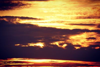 Scenic view of dramatic sky during sunset