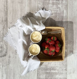 High angle view of fruits in plate on table