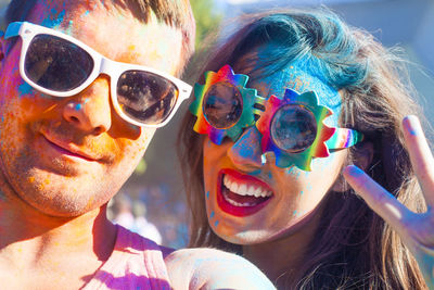 Portrait of smiling woman wearing sunglasses