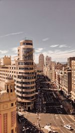 Buildings in city against sky