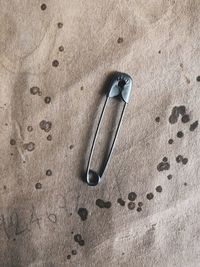 High angle view of coin on table