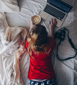 High angle view of woman using mobile phone