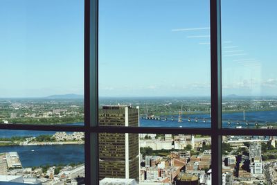 City buildings seen through window