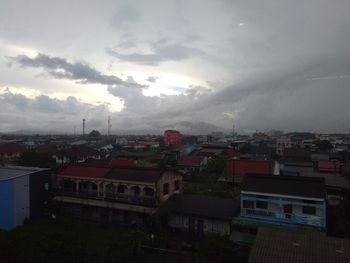 High angle view of residential district against sky