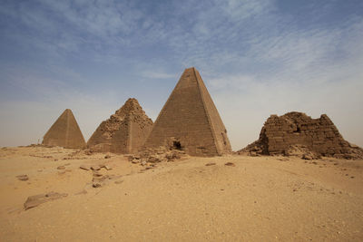 Ancient temple against sky