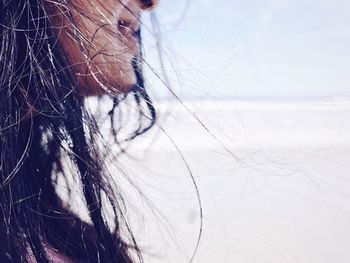 Cropped image of woman at beach