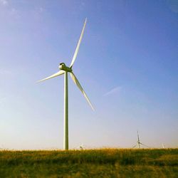 Wind turbines on field