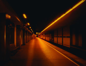 Illuminated corridor at night