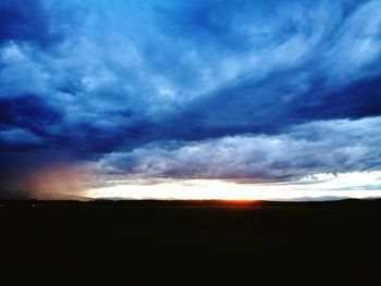 Scenic view of dramatic sky during sunset