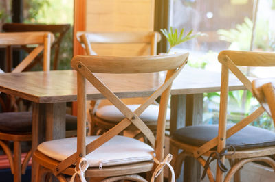 Empty chairs and table in restaurant