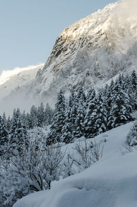 Scenic view of snow covered mountain against sky