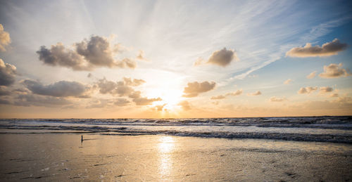 Scenic view of sea at sunset