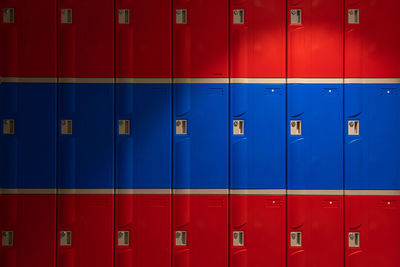 Blue and red lockers. horizontal full frame shot