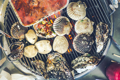 High angle view of seafood grilling on barbeque