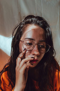 Close-up portrait of young woman