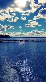 Scenic view of sea against blue sky