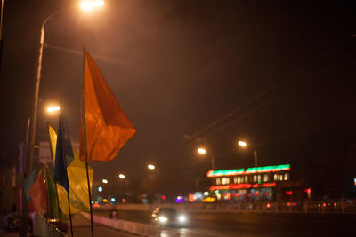 Illuminated street light at night