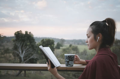 Young woman using mobile phone