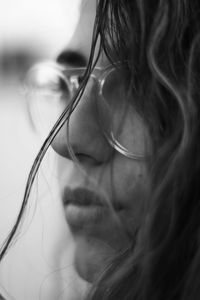 Close-up of thoughtful woman wearing eyeglasses