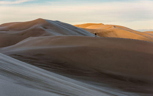 Scenic view of desert against sky