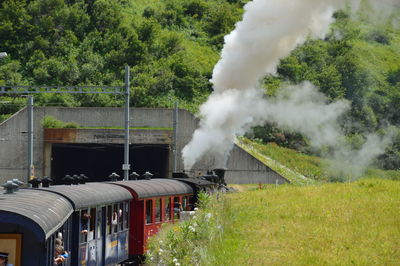 Passengers in steam train