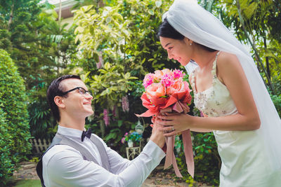 Close-up of couple standing outdoors