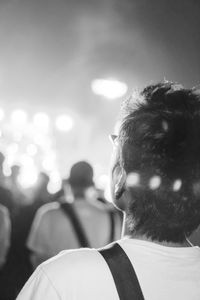 Rear view of woman at music festival
