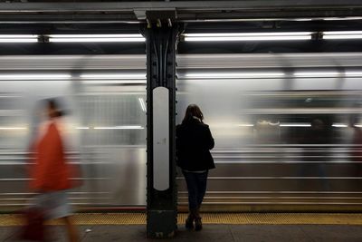 Blurred motion of train at subway station