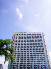 Low angle view of built structure against blue sky