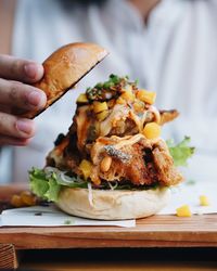 Close-up of hand preparing food