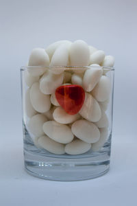 Close-up of eggs in white background