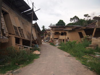 Street amidst buildings against sky