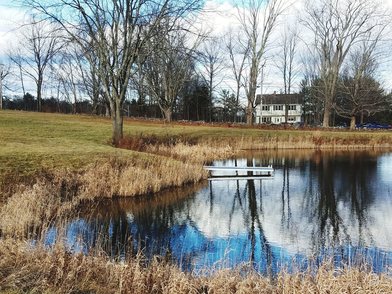 REFLECTION OF HOUSE ON WATER