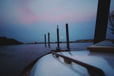 Close-up of sea against sky during sunset
