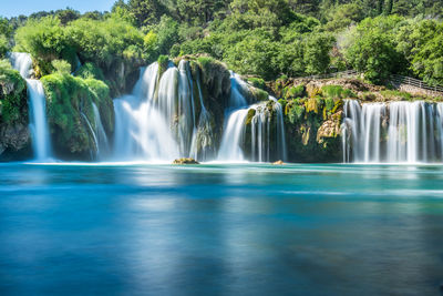 View of waterfall in forest